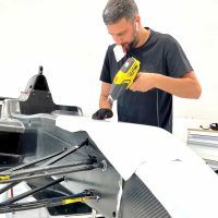 CARLOS CARTELLONE HACIENDO WRAPPING